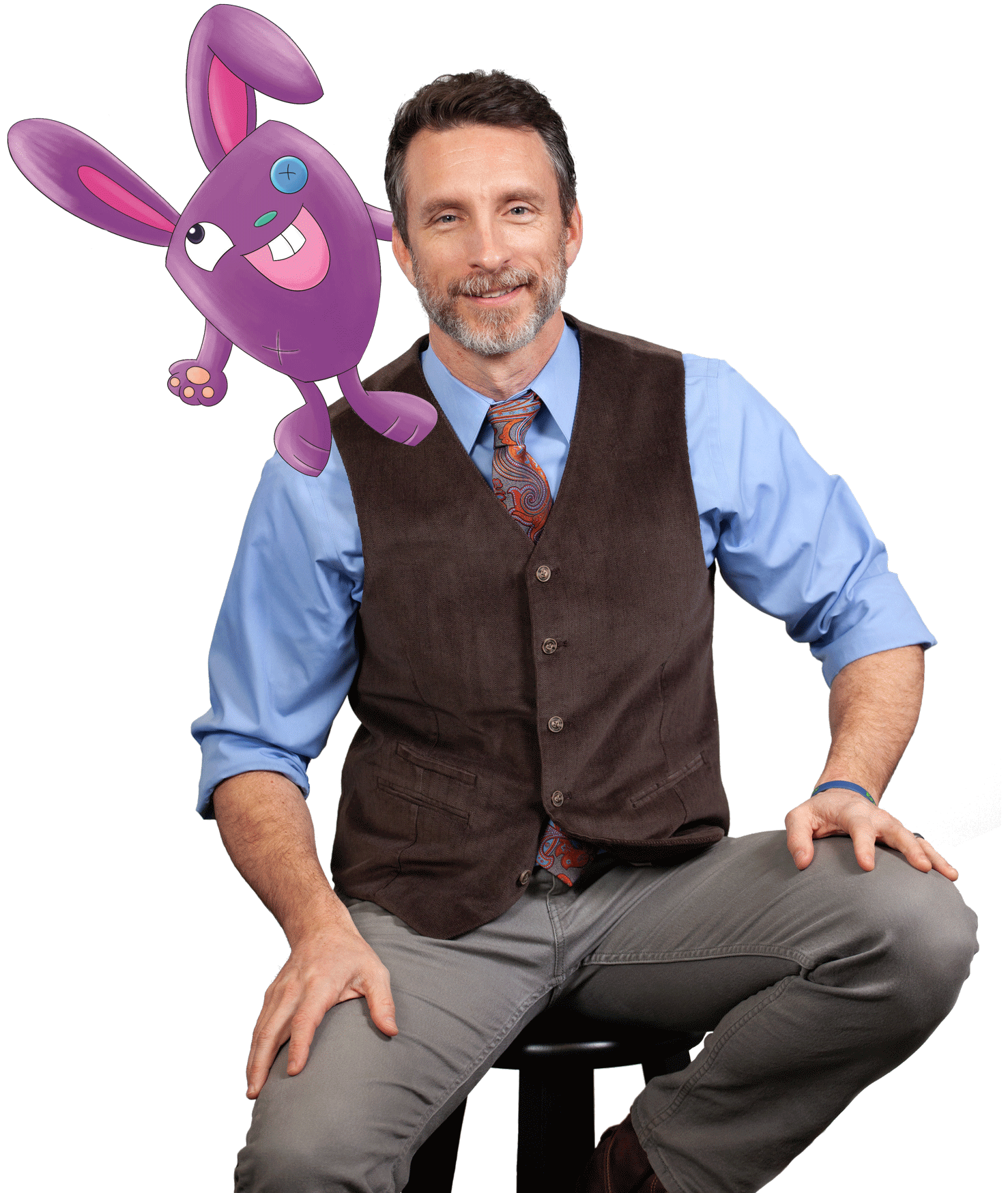 Mike sitting on a black stool, wearing a blue button-up and brown vest with an illustrated, purple bunny standing on his shoulder.